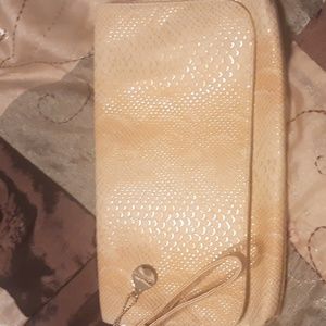 Golden BIG BUDDHA clutch/wristlet.